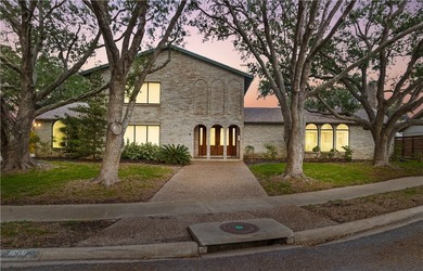 Nestled on an oversized cul-de-sac lot in the highly desirable - photo 1