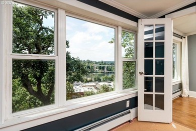 Perched above the Willamette River, this timeless Craftsman - photo 28