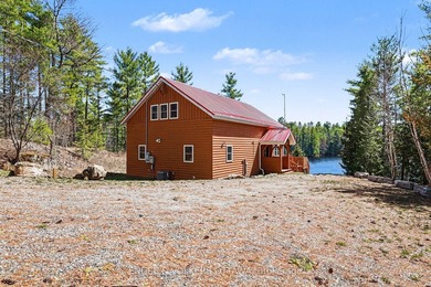 Set along the quiet shores of Shawenegog Lake, 1244 Marshall - photo 38