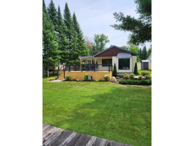 Lake Home For Sale in Harrison, Michigan