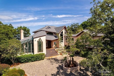 Set atop one of the highest elevations in Gulf Breeze, this - photo 3