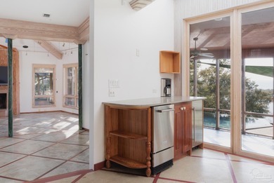 Set atop one of the highest elevations in Gulf Breeze, this - photo 10