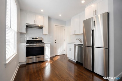 Stunning, renovated side-by-side duplex on a quiet cul-de-sac in - photo 4
