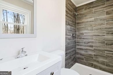 Welcome to this beautifully renovated four-bedroom - photo 22