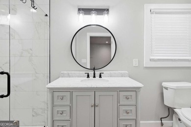 Welcome to this beautifully renovated four-bedroom - photo 34