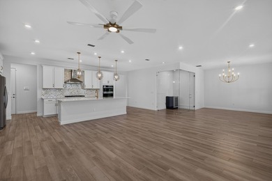 This layout impressively opens into the main living areas - photo 13