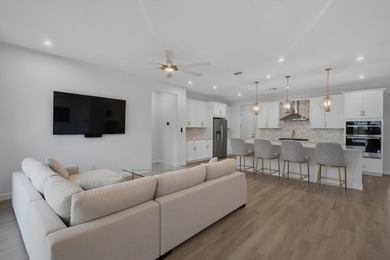This layout impressively opens into the main living areas - photo 14