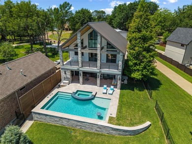 Welcome to this stunning gated 3-bedroom, 3-bathroom lake home - photo 32