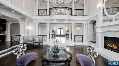 Welcome to this custom-built estate situated high atop the - photo 11