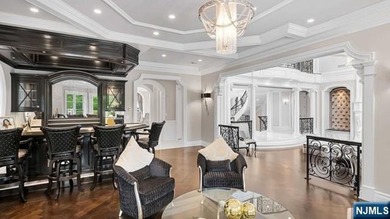 Welcome to this custom-built estate situated high atop the - photo 15