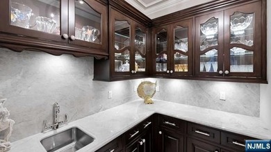 Welcome to this custom-built estate situated high atop the - photo 22