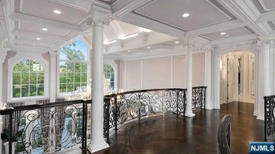 Welcome to this custom-built estate situated high atop the - photo 24
