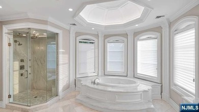 Welcome to this custom-built estate situated high atop the - photo 28