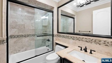 Welcome to this custom-built estate situated high atop the - photo 31