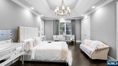 Welcome to this custom-built estate situated high atop the - photo 32