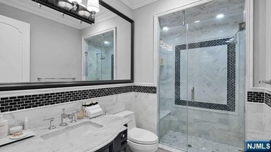 Welcome to this custom-built estate situated high atop the - photo 33