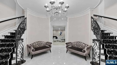 Welcome to this custom-built estate situated high atop the - photo 35