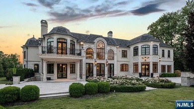 Welcome to this custom-built estate situated high atop the - photo 42