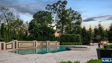 Welcome to this custom-built estate situated high atop the - photo 44