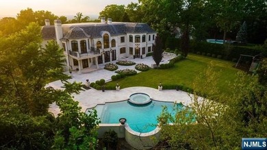 Welcome to this custom-built estate situated high atop the - photo 45