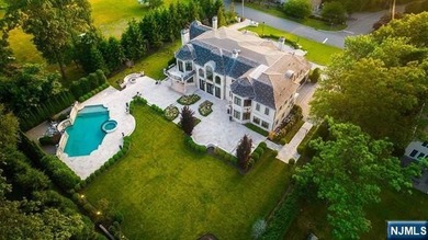 Welcome to this custom-built estate situated high atop the - photo 46