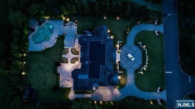 Welcome to this custom-built estate situated high atop the - photo 48