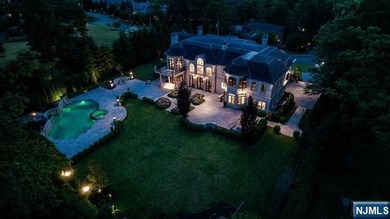 Welcome to this custom-built estate situated high atop the - photo 49