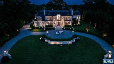 Welcome to this custom-built estate situated high atop the - photo 50