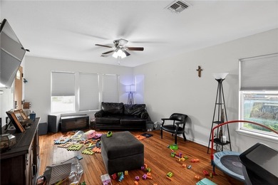 Charming three bed, two bath home with wood floors throughout - photo 10