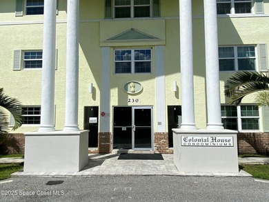 This charming top floor end unit overlooking the sparkling pool - photo 1