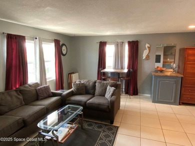 This charming top floor end unit overlooking the sparkling pool - photo 3