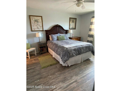 This charming top floor end unit overlooking the sparkling pool - photo 8