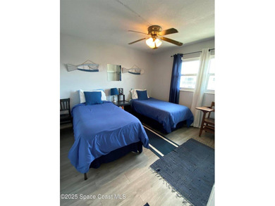 This charming top floor end unit overlooking the sparkling pool - photo 10