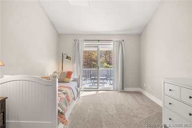 This stunning reverse 2-story lakefront home on MM 3 in Eldon - photo 11