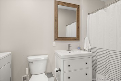 This stunning reverse 2-story lakefront home on MM 3 in Eldon - photo 13