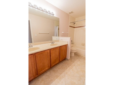Nestled in Victoria Parc at Tradition, this stunning lakefront - photo 13