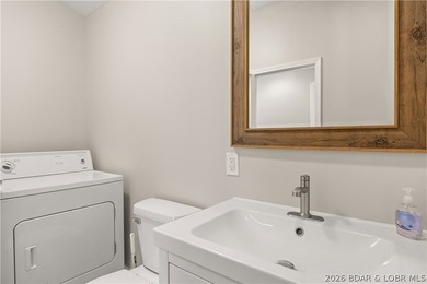 This stunning reverse 2-story lakefront home on MM 3 in Eldon - photo 14