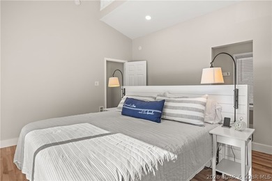 This stunning reverse 2-story lakefront home on MM 3 in Eldon - photo 17
