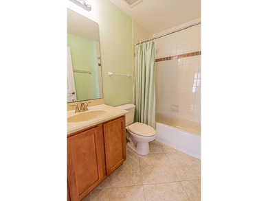 Nestled in Victoria Parc at Tradition, this stunning lakefront - photo 17