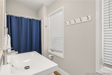 This stunning reverse 2-story lakefront home on MM 3 in Eldon - photo 18