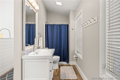 This stunning reverse 2-story lakefront home on MM 3 in Eldon - photo 19
