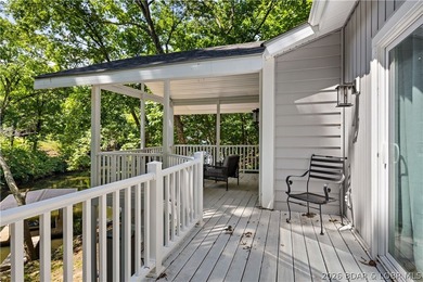 This stunning reverse 2-story lakefront home on MM 3 in Eldon - photo 20