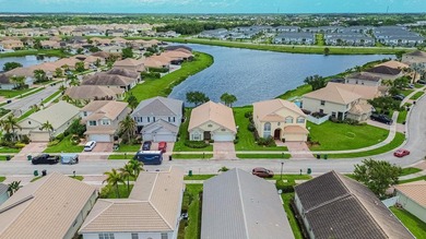 Nestled in Victoria Parc at Tradition, this stunning lakefront - photo 23