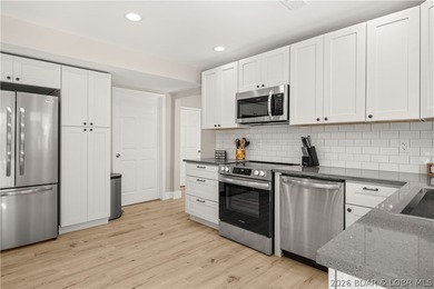 This stunning reverse 2-story lakefront home on MM 3 in Eldon - photo 27