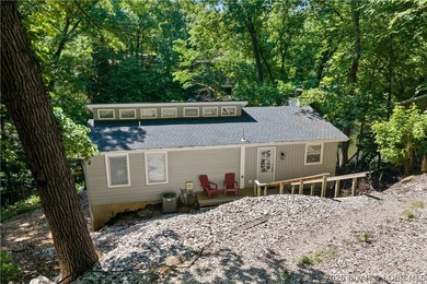 This stunning reverse 2-story lakefront home on MM 3 in Eldon - photo 41