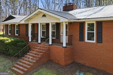 Welcome to this beautifully renovated four-bedroom - photo 1