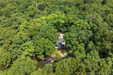 This stunning reverse 2-story lakefront home on MM 3 in Eldon - photo 42