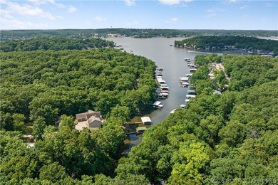 This stunning reverse 2-story lakefront home on MM 3 in Eldon - photo 43