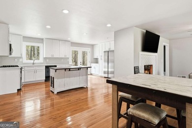 Welcome to this beautifully renovated four-bedroom - photo 7