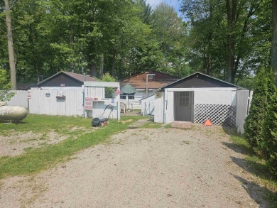 Lake Home For Sale in Harrison, Michigan